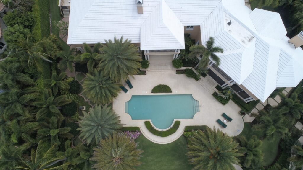 home mortgage, aerial view photography of white house near swimming pool